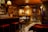 A cozy cantina interior with dim lighting and rustic decor, inviting patrons to unwind.