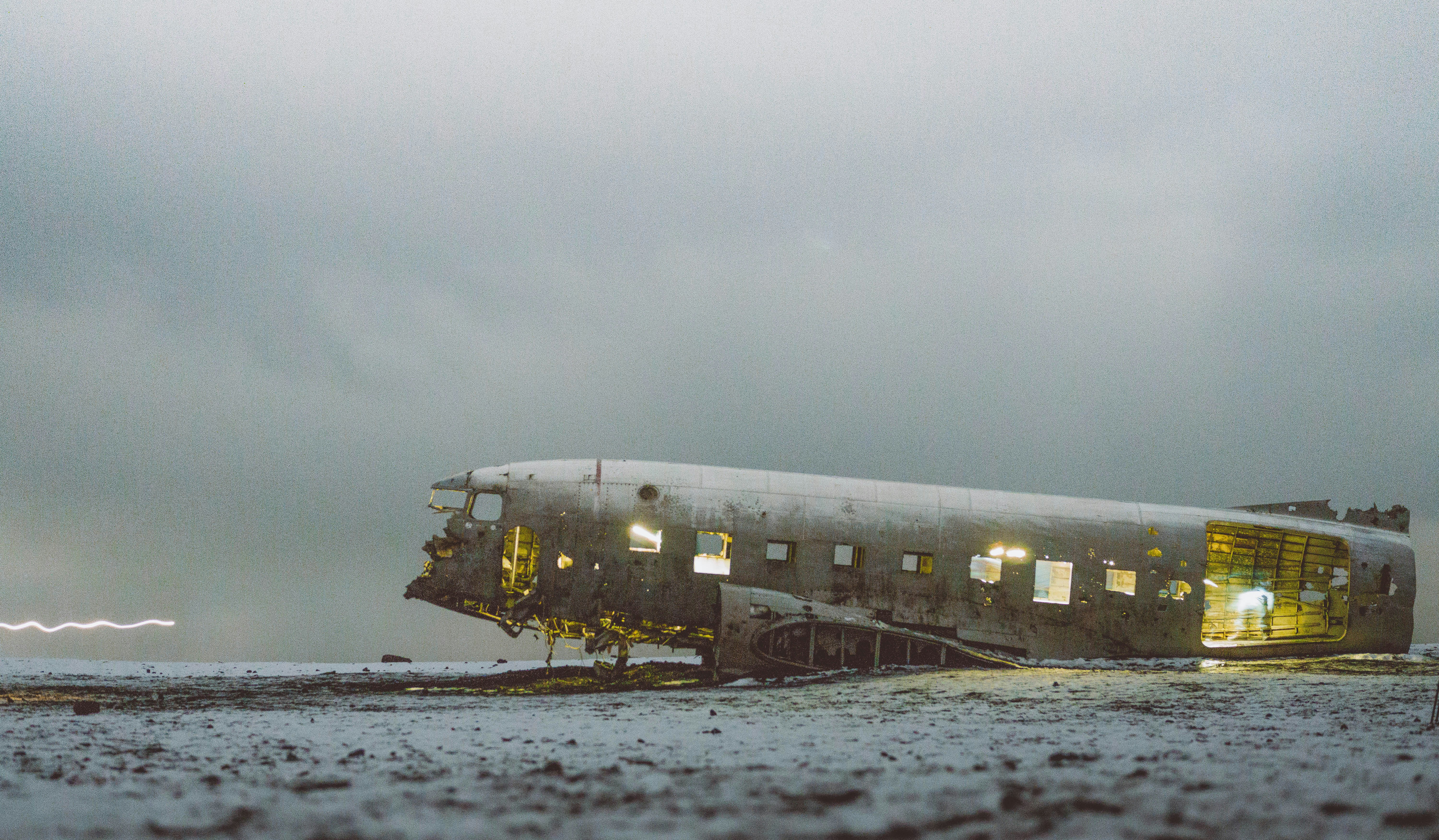 abandoned plane under white sky, Crash site