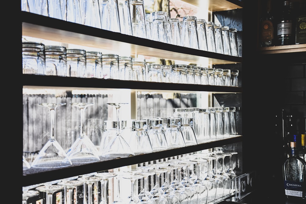 clear wine and martini glasses in the shelf