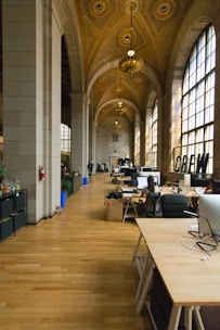 A polished, artistic portrait of an entrepreneur in a modern workspace, blending luxury and innovation.