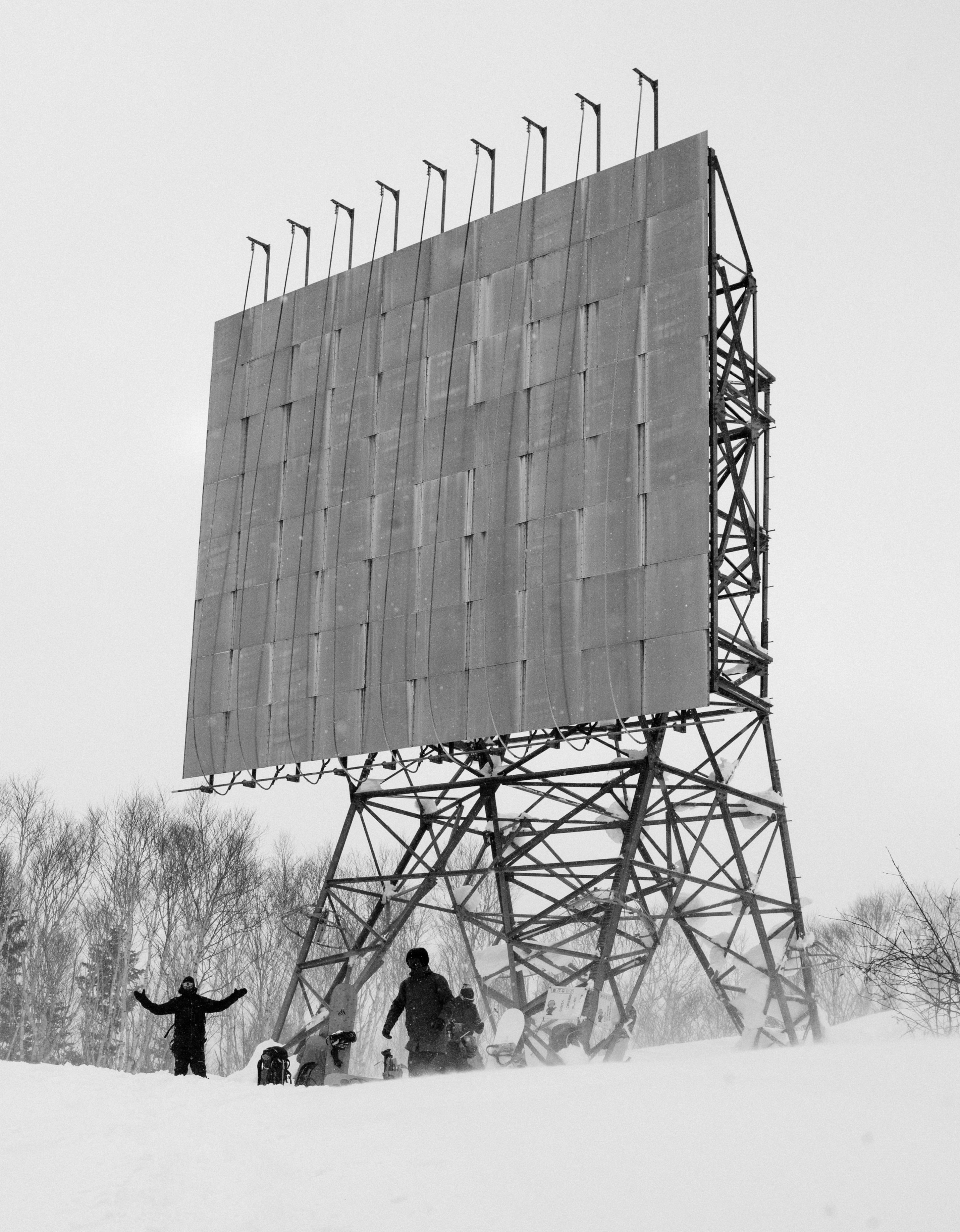 Before installation photo of NH-66 Highway location showing empty billboard structure and surrounding landscape