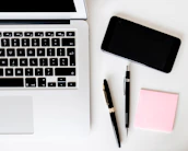 two pens near MacBook Air