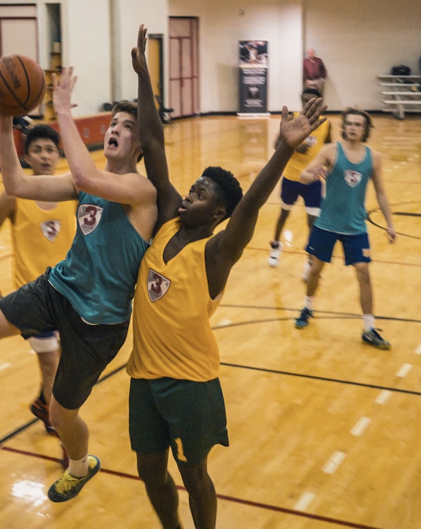 group of people playing basketball