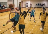 group of people playing basketball