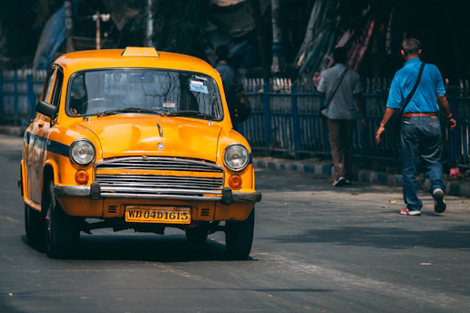 yellow cab on the road