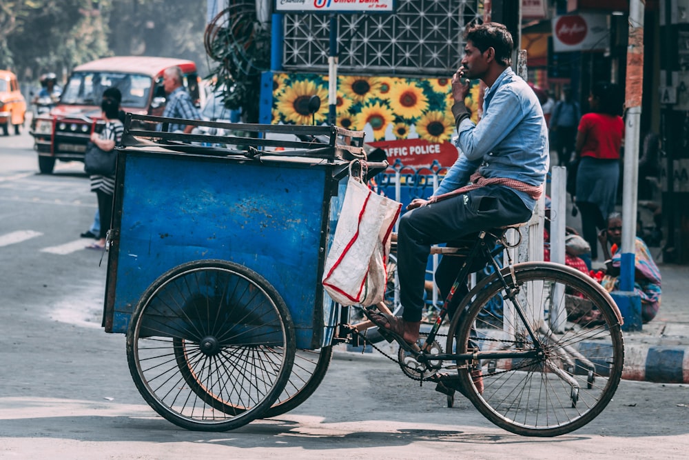 man riding bike