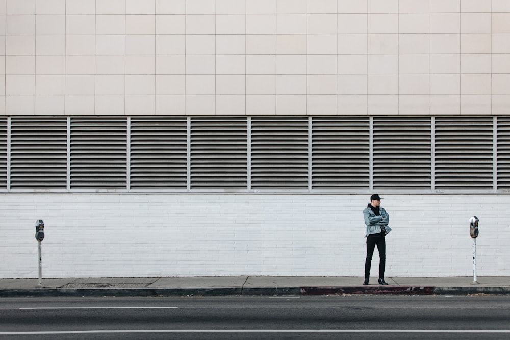 man standing on the sidewalk