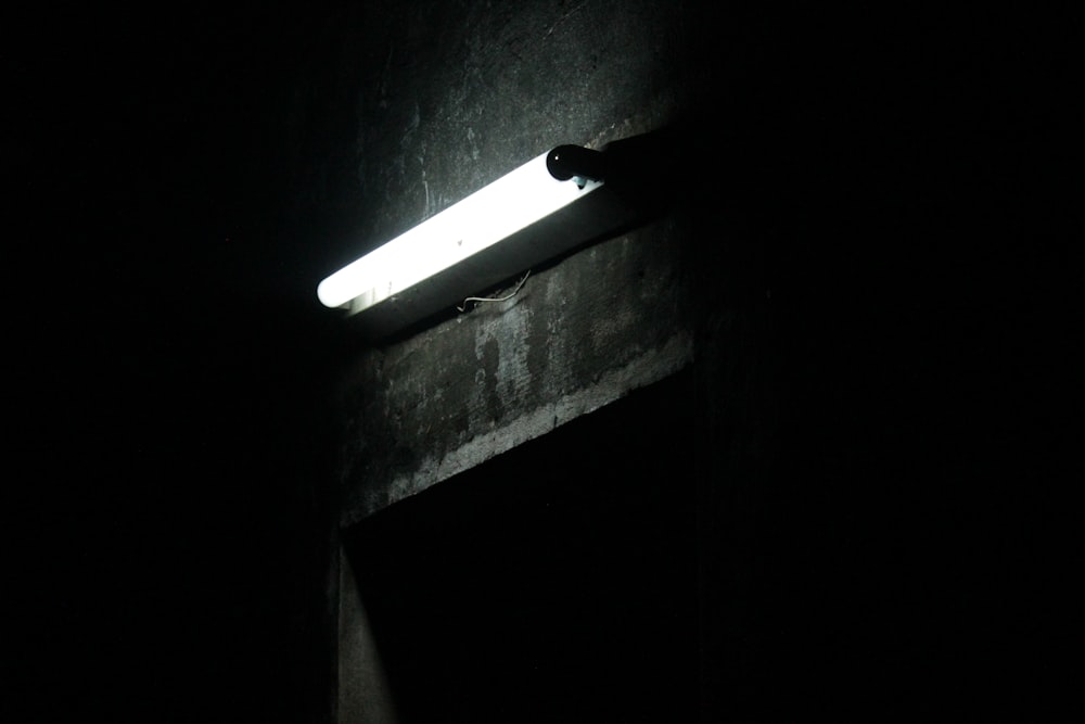 white fluorescent lamp on wall