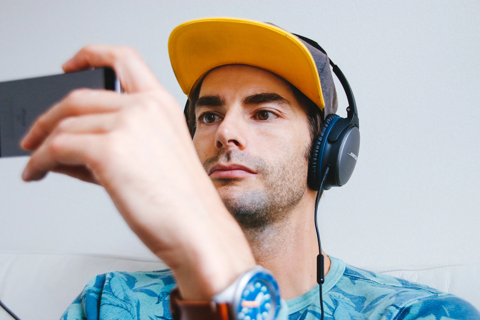 Person listening to media on a smartphone