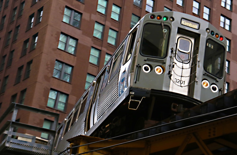 gray train near building