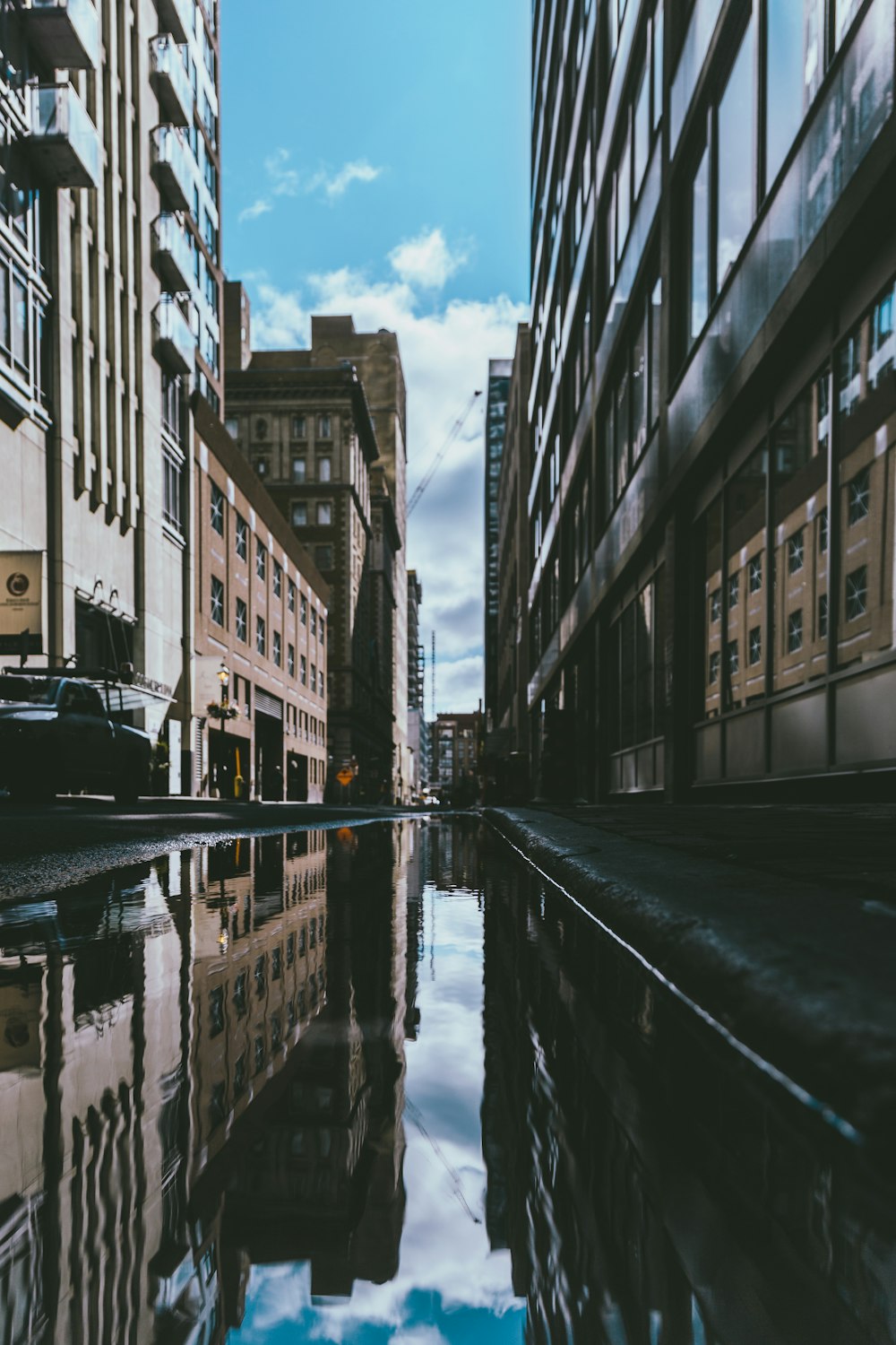 photography of body of water on street