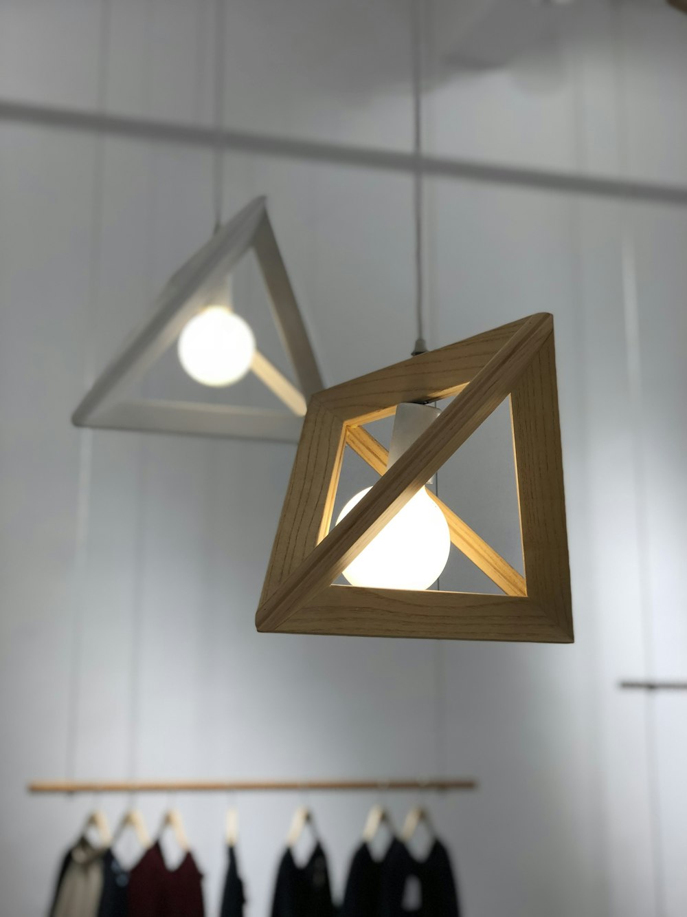 closeup photo of brown and white pendant lamp