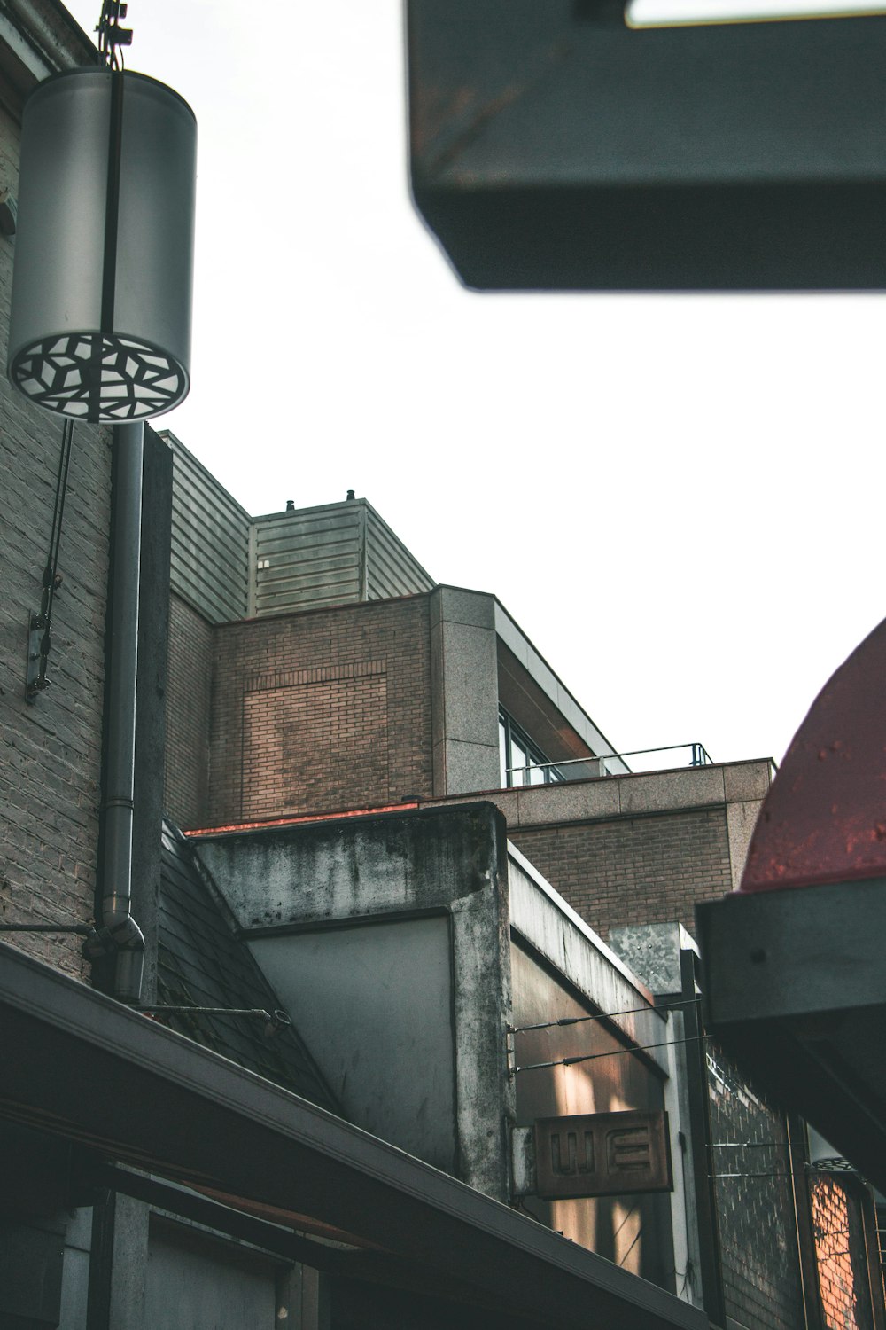 low angle photo of gray concrete buildings