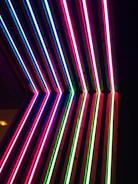 Dark neon-tech landing page layout with glowing mint and violet highlights