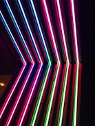 A vibrant digital campaign showcasing bold pink and dark tones with dynamic visuals.