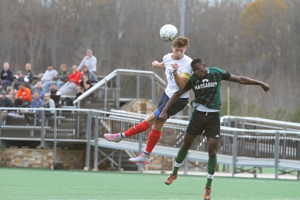 soccer players jumping