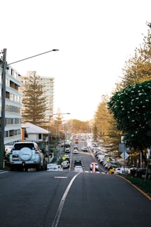 photo of cars on road