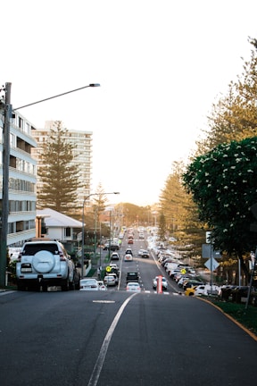 photo of cars on road