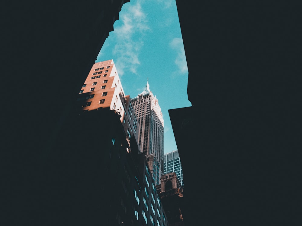 low angle photography of white high-rise building