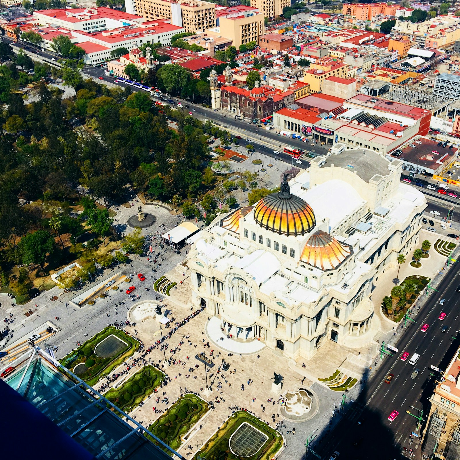 Colorful buildings and vibrant street scene in Mexico City