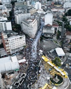 Aerial shot of a bustling outdoor event with a vibrant crowd