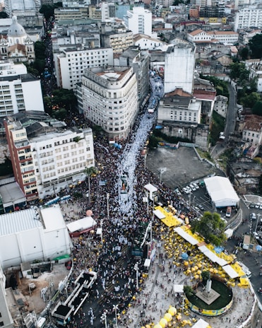 Aerial perspective of a bustling outdoor event with people.
