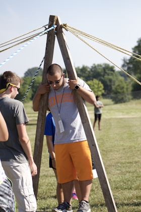 Vibrant image of a corporate team engaged in an outdoor team-building activity.