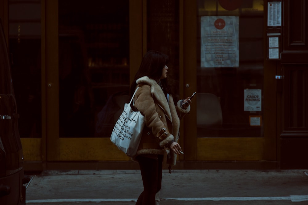 woman on side street during daytime