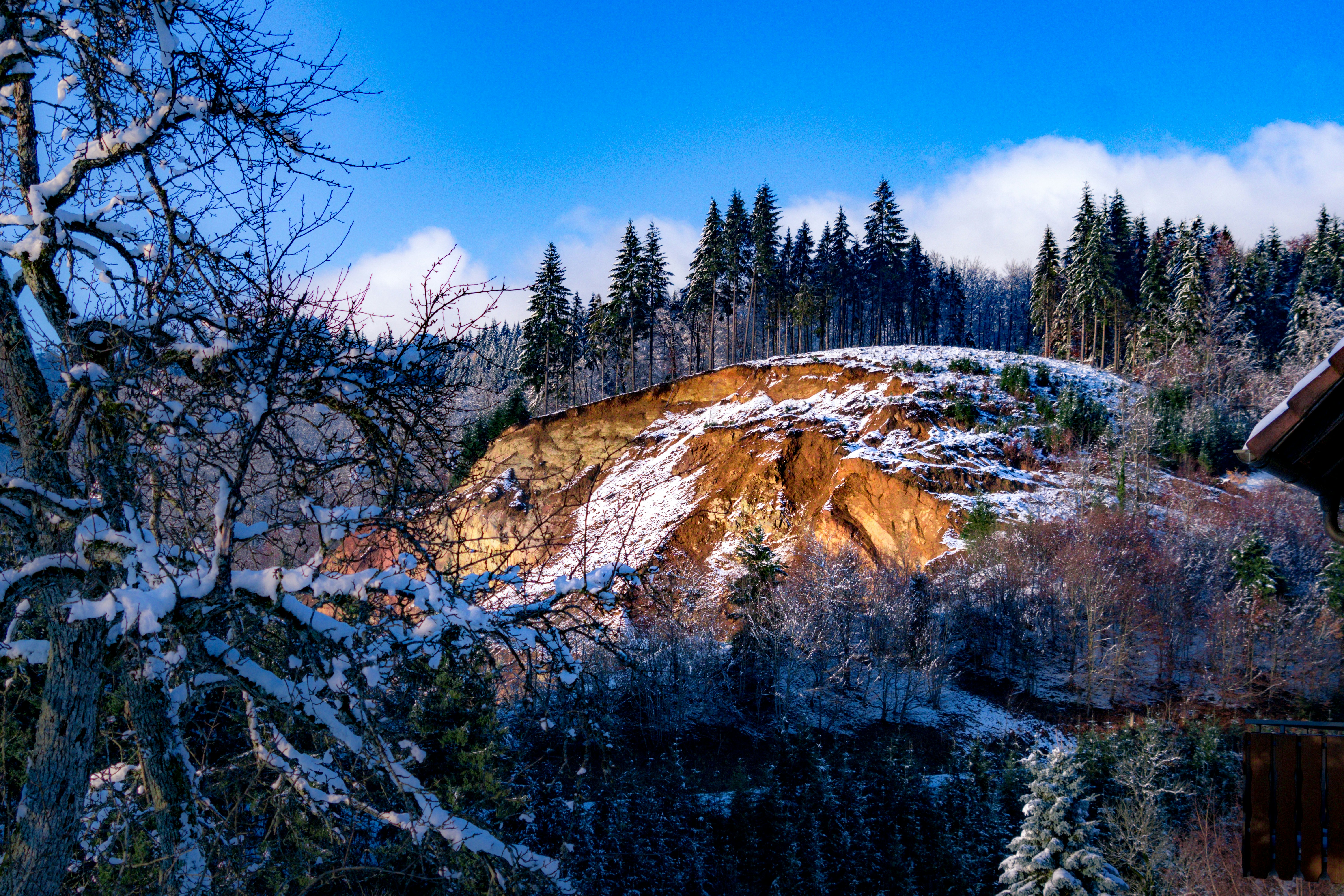landscape photography of mountains surrounded by trees