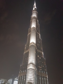 Evening lights illuminating a completed private sector project, highlighting its scale and precision.