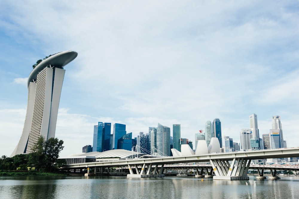 landscape photography of concrete structures near body of water