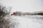 red house surrounded with snow and trees