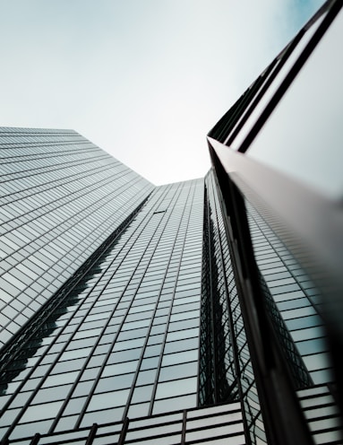 worm's eye view of glass building