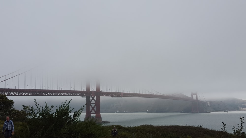 Golden Gate Bridge gate, San Francisco California covered with fogs during daytime