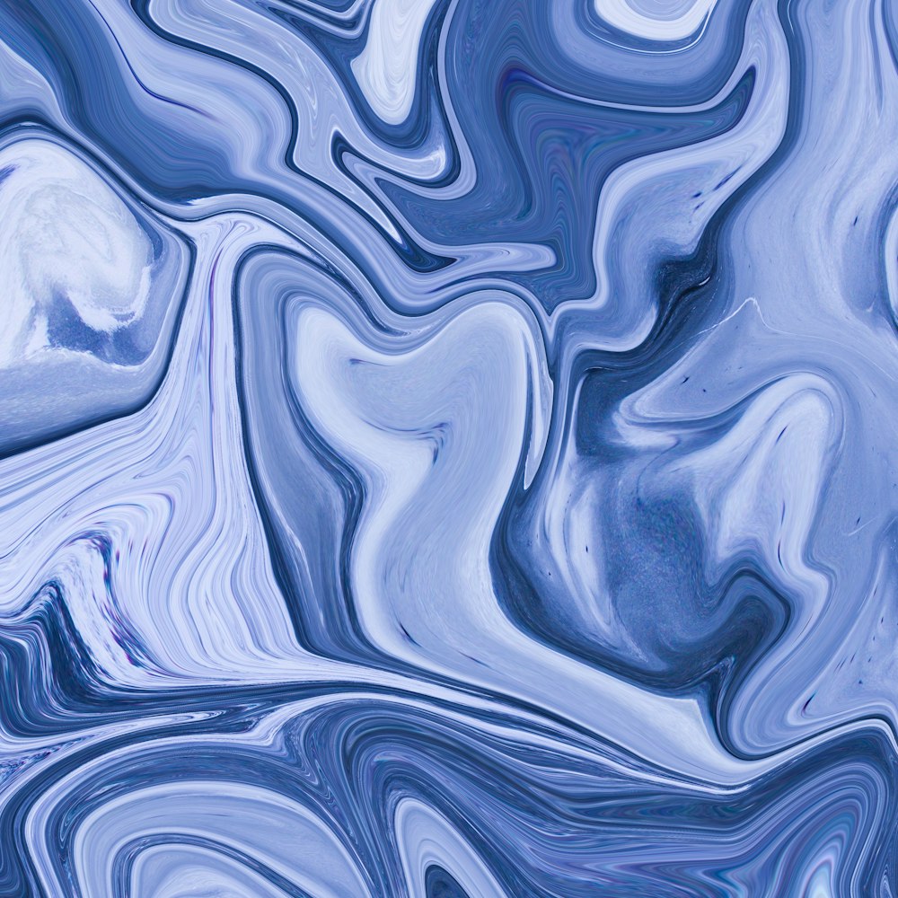 물결 모양의 디자인이 있는 파란색과 흰색 배경