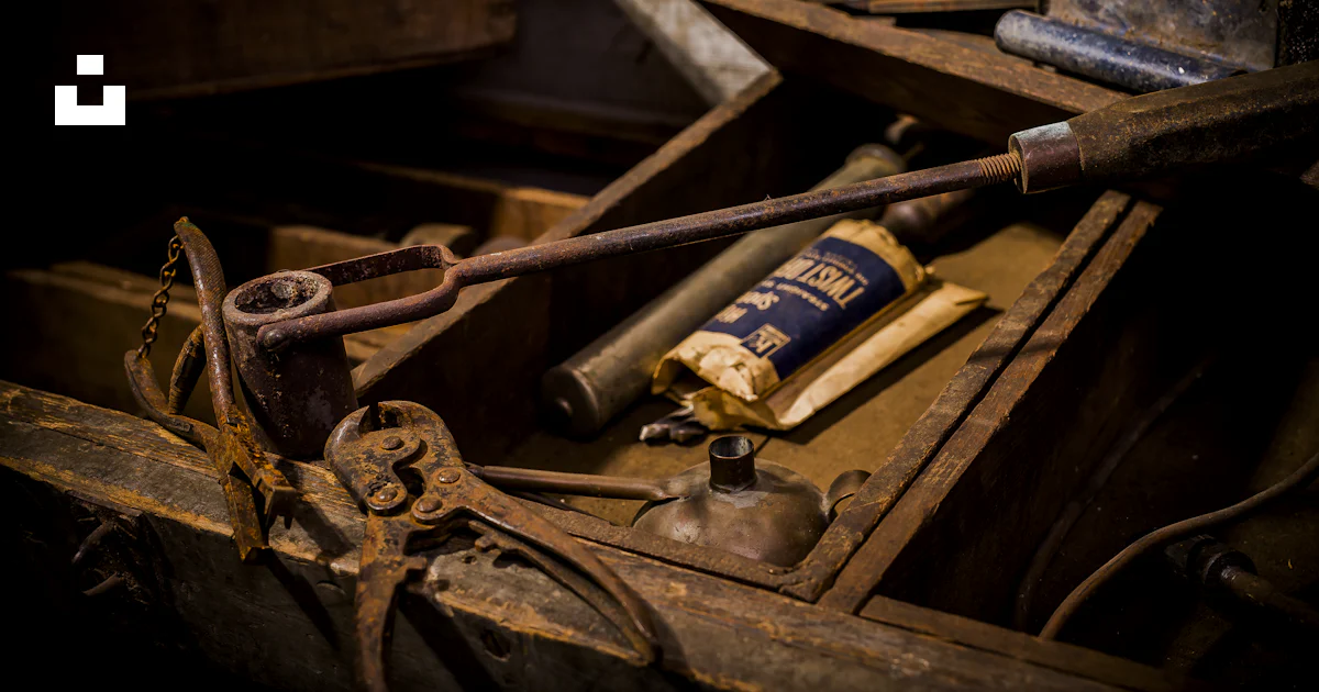Rusted cutter on wooden rack photo – Free Denver Image on Unsplash