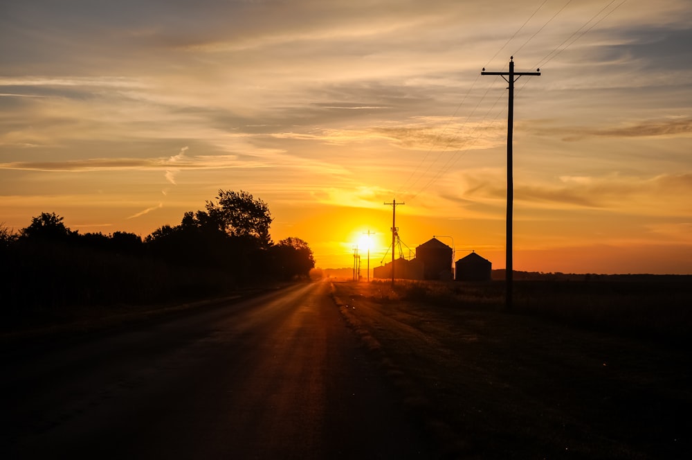 barns during sunset