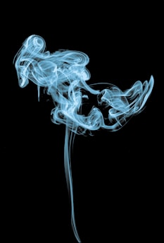 white smoke inside the dark room