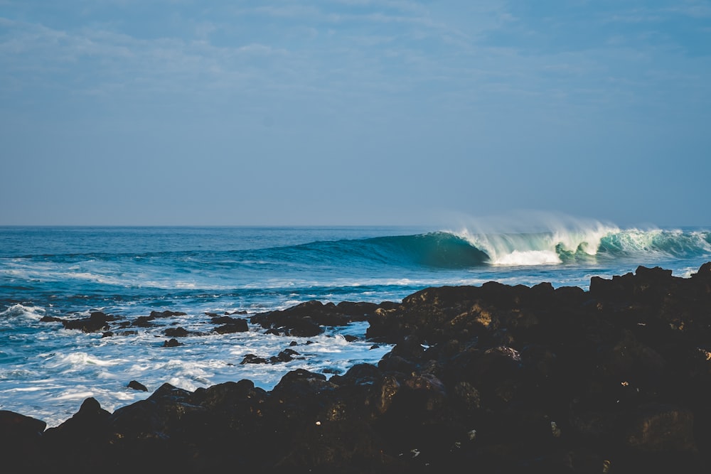 crashing waves through shores