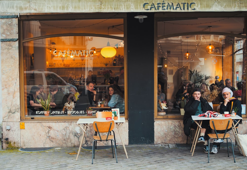 people sitting inside cafe