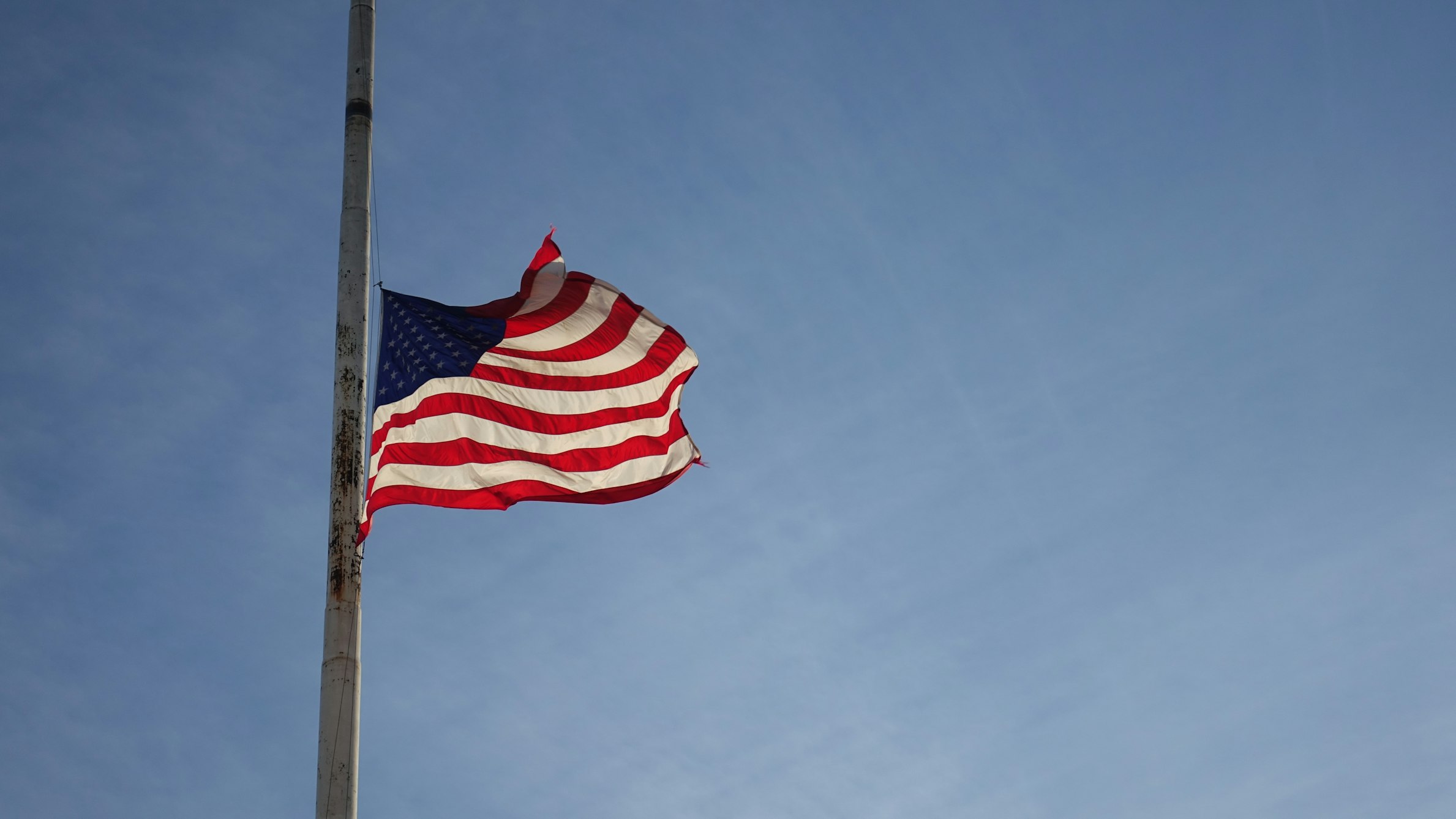 American flag at half mast for memorial day