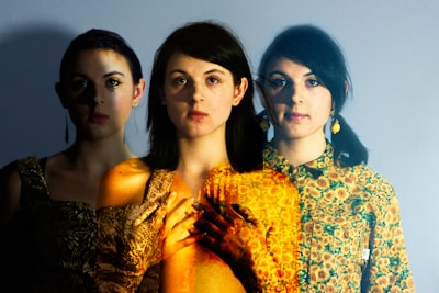 Side-by-side images illustrating style transformations applied to user photos.