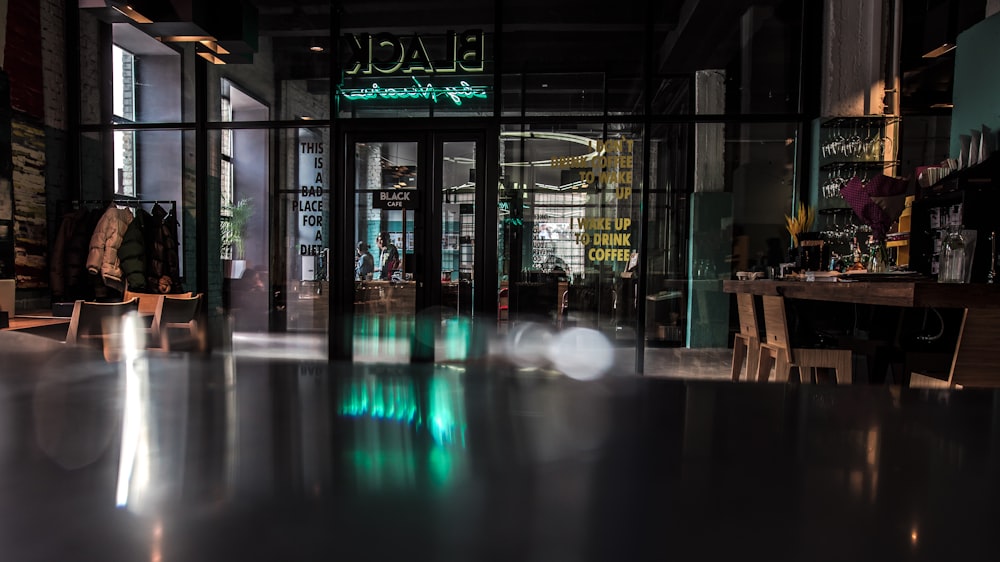 bar with chairs and glass door