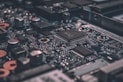 macro photography of black circuit board