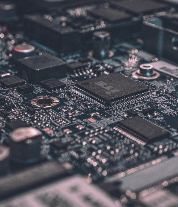 macro photography of black circuit board