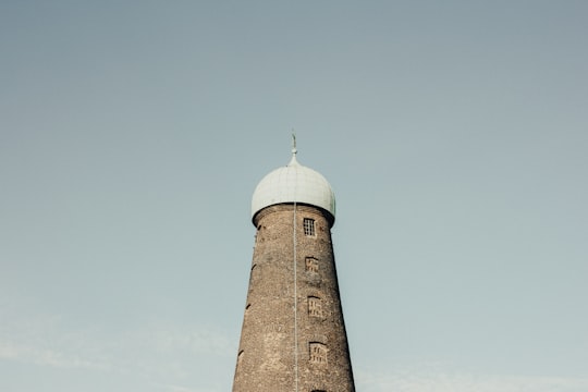 brown and white mosque under blue sky in St. Patrick's Tower Ireland