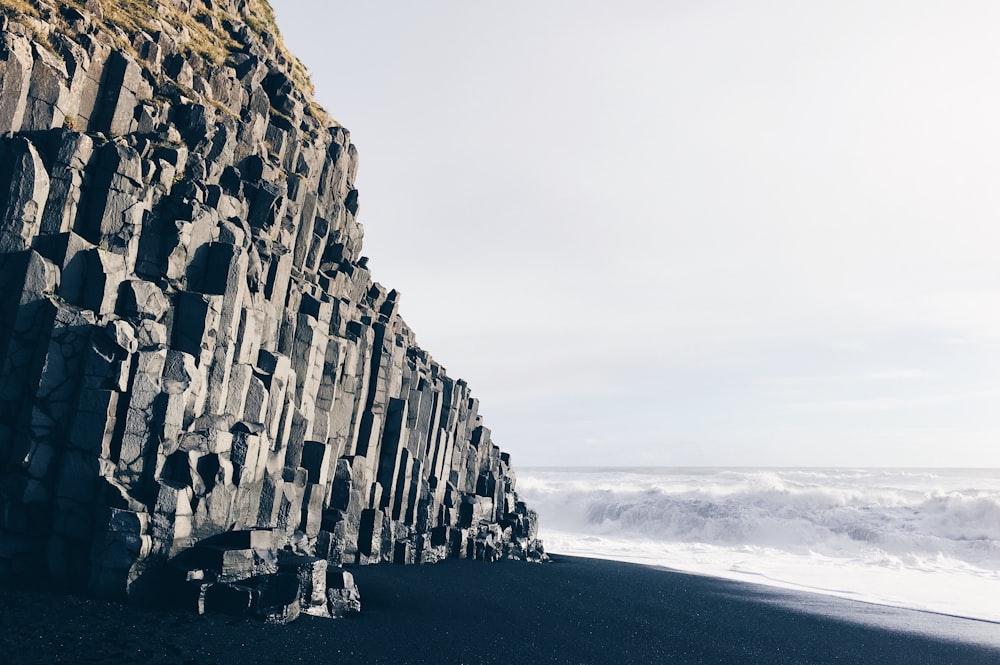 photo of sea waves on shore