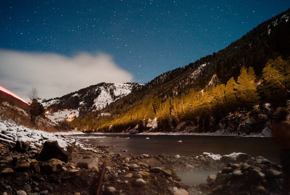 brown mountain under clear bly sky