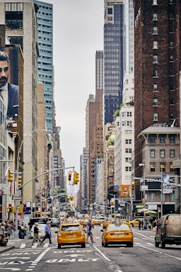 street photography,how to photograph what would be manhattan without the yellow cabs?; person crossing pedestrian lane