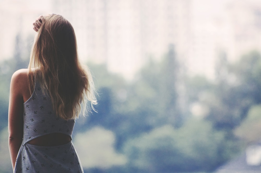 selective focus photography of woman standing